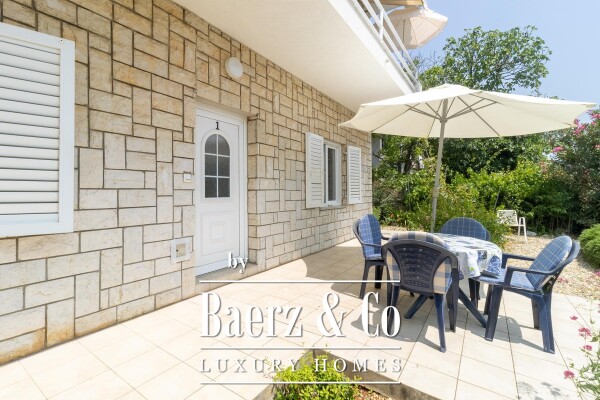 photo 2 Krk, house with three residential units and a large garden in the center