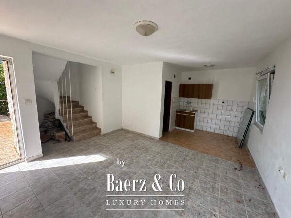 photo 10 House with a Plot in a Premium Location for Renovation